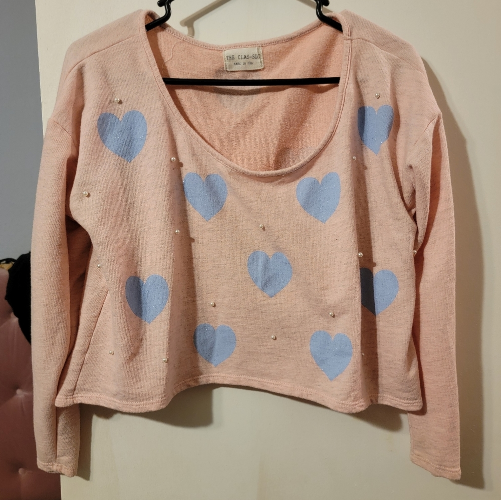 The Clas-sic Pink Sweater